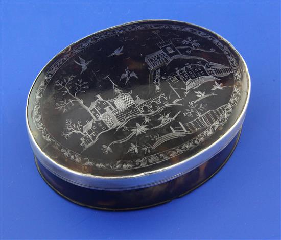 An 18th century tortoiseshell and silver pique oval table snuff box, 4in.